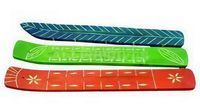 Carved Wooden Incense Burners in red, green, and blue with decorative patterns, top view