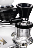 Close-up of Diamond Glass Big Puck Dab Rig with black bowl, heavy wall glass, and percolator