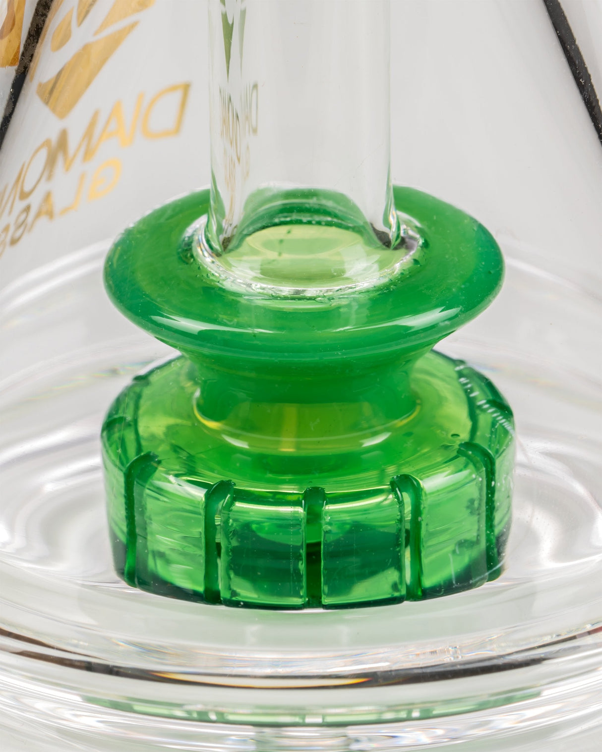 Close-up of Diamond Glass Gavel Hammer Bubbler's green showerhead percolator and clear body.