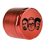 Red aluminum 4-part herb grinder with diamond-shaped teeth, side view on white background