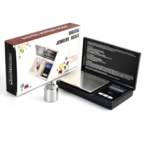 DigiWeigh Digital Jewelry Scale open box with 100g capacity and 0.01g accuracy, including calibration weight