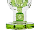 Calibear Exosphere Dab Rig with intricate green accents and beaker design, 14mm joint - front view