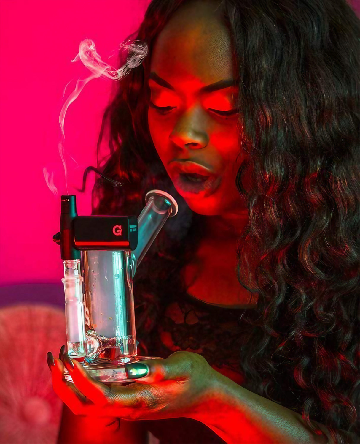 Woman using G-Pen Connect X Higher Standards Riggler Bundle, electric dab rig with sidecar design