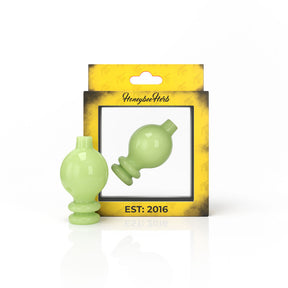 Honeybee Herb Green MILK BUBBLE CARB CAP for Dab Rigs, front view on branded packaging