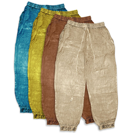 Assorted acid wash harem pants in blue, yellow, brown, and beige, unisex one size fits all