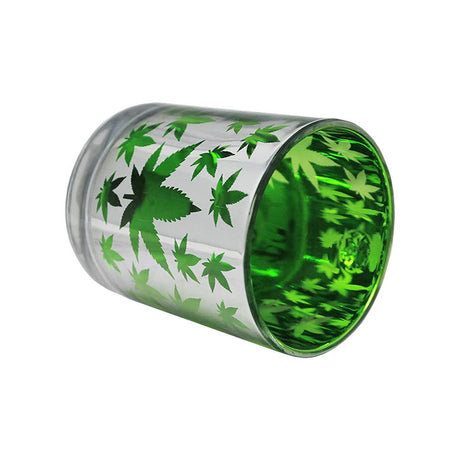 Metallic glass coffee mug with green hemp leaf design, 16oz, tilted view on white background