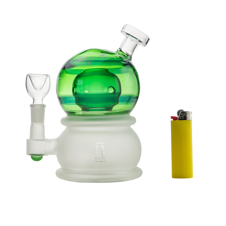 Hemper Crystal Ball XL Rig in green with a deep bowl, front view, next to a yellow lighter for scale