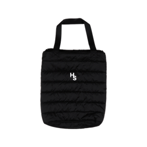 Higher Standards black quilted tote bag with white logo, front view on a seamless white background