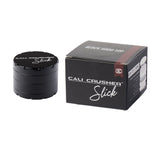 Cali Crusher O.G. Slick Grinder 2.5" in Black - Front View with Packaging