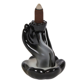 Lotus in Hand Black Ceramic Backflow Incense Burner with lit incense cone