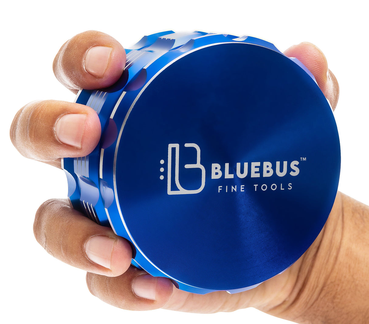 Hand holding Blue Bus Fine Tools GA Aluminum Grinder in blue, 3.5" size, durable design, front view