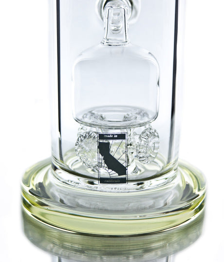 Close-up of MAV Glass 10'' Bong with Barrel to Quad Gear Perc, clear glass on seamless white background