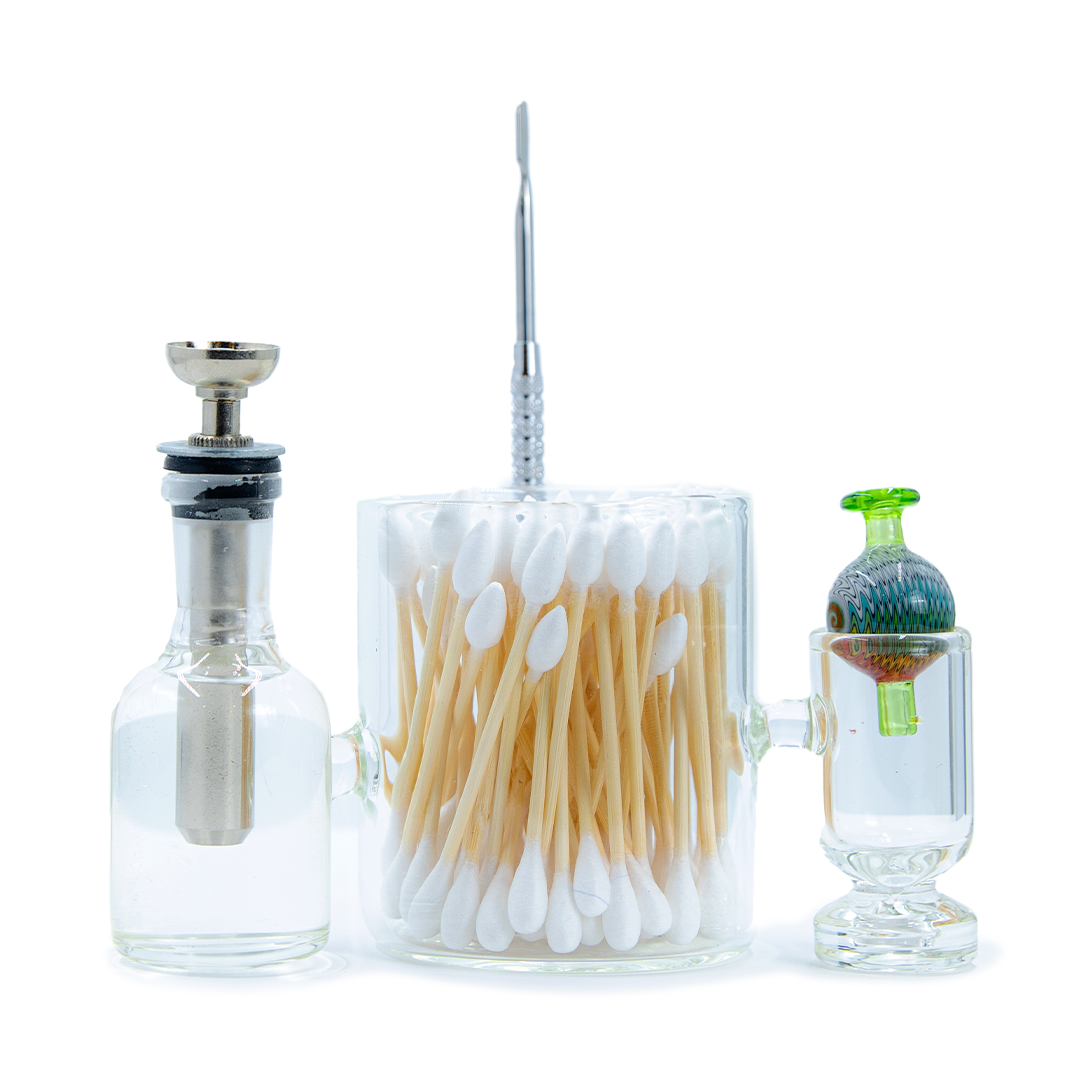 Apex Ancillary Iso Stations cleaning kit with clear glass bottles and cotton swabs front view