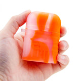 Hand holding PILOT DIARY Orange Silicone One Hitter Dugout with Keychain for discreet use