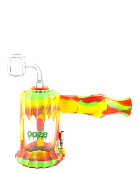 Ooze Clobb Silicone Pipe in Rasta colors, side view, with glass bowl and titanium nail for versatility