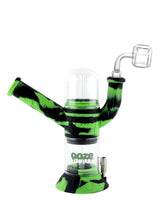 Ooze Cranium Bong & Dab Rig in black and green with quartz banger, front view on white background