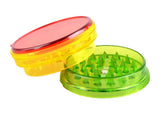 Rasta-colored 3-piece plastic grinders, 12 pack, portable design with steel teeth, 2.25" size, for dry herbs