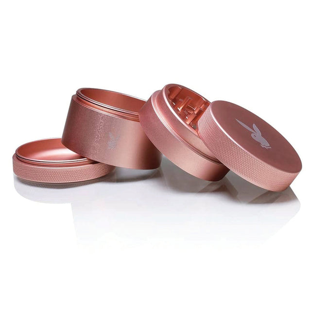 Playboy x RYOT Rose Gold Solid Body Grinder, 4pc with textured grip, front and top view
