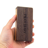 Hand holding PILOT DIARY Wooden Magnetic Dugout - Front View with Engraved Logo