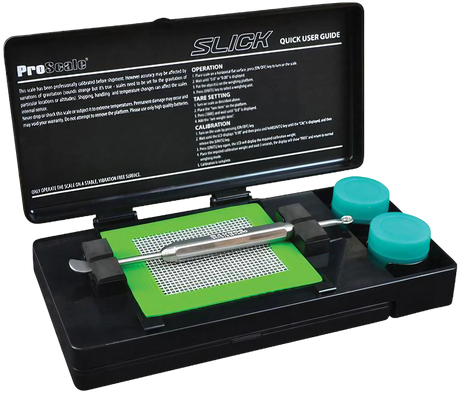Pro Scale Slick Concentrate Kit & Scale, open case view with steel dabber and silicone jars