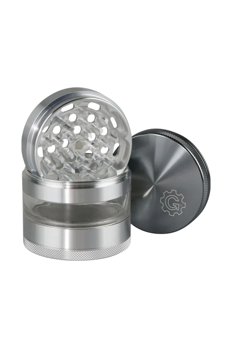 Pulsar 2.5" Aluminum 4pc Grinder with transparent stash window, showcasing sharp teeth and compact design.