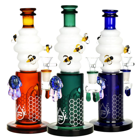 Pulsar Killa Bees Water Pipes in orange, green, and blue with honeycomb design and bee accents