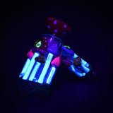 Pulsar Shroom Forest Bubbler Pipe with glow-in-the-dark mushrooms, 8" 19mm, angled view