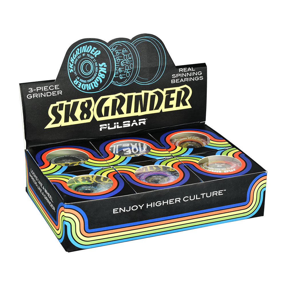 Pulsar SK8 Grinder display box with 3-piece metal grinders in swirl colors, front view