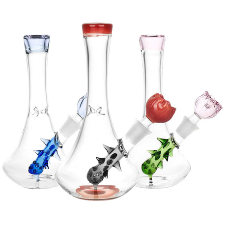 Radical Rose Beaker Water Pipes in blue, red, and green with artistic rose-shaped bowls, front view on white background