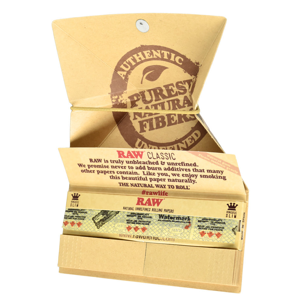 RAW Artesano Kingsize Slim Rolling Papers pack open to show papers and tips