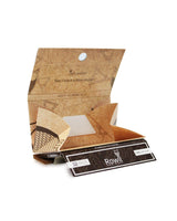 Rowll Rolling Kit open pack showing unbleached papers and built-in grinder, portable design