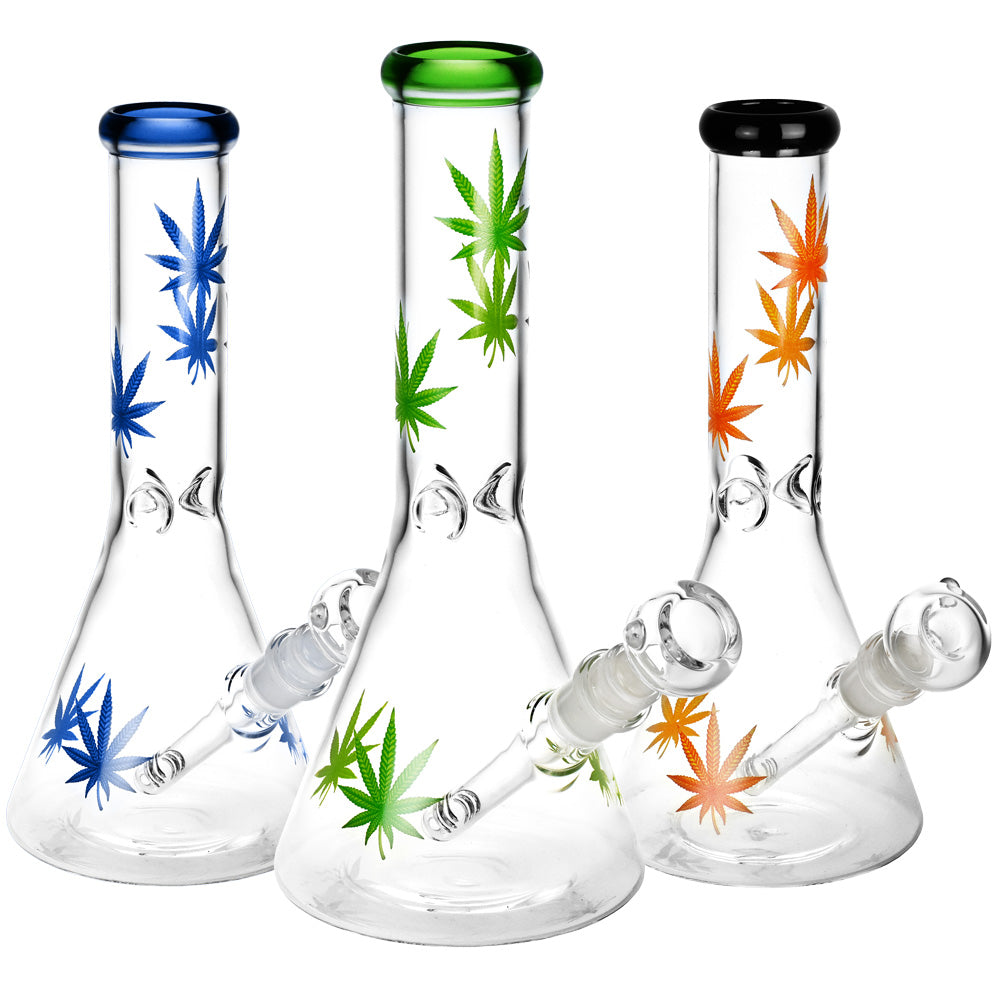 Trio of Sacre Bleu Leaf Print Beaker Glass Water Pipes with colorful leaf designs, front view on white background