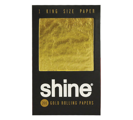 Shine 24K Gold Kingsize Rolling Paper, front view on black background, luxurious gold design