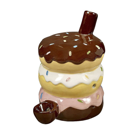 Ceramic pipe shaped like a stack of colorful donuts with deep bowl, front view on white background