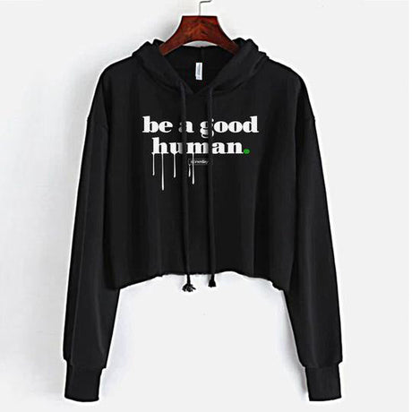 StonerDays Be A Good Human black crop top hoodie with white text, front view on a hanger