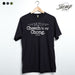 StonerDays black hemp tee with 'Cheech to my Chong' print, front view on hanger