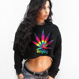 StonerDays Enjoy Tie Dye Crop Top Hoodie with vibrant rainbow cannabis leaf design, front view on model