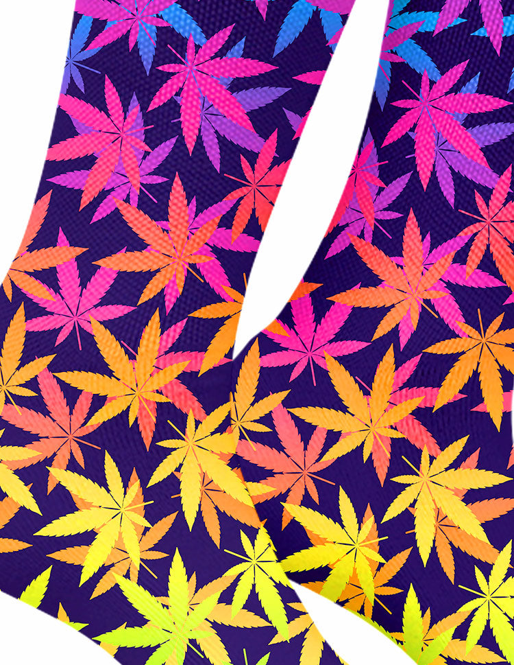 StonerDays Fluorescent Flowers Weed Socks with vibrant UV reactive pattern, close-up view