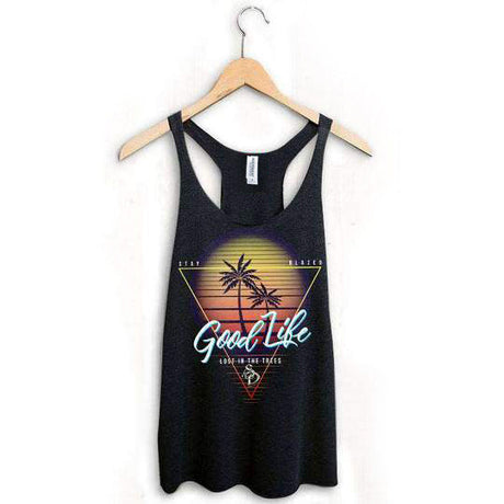 StonerDays Good Life Racerback tank top in orange and yellow, hanging on a wooden hanger