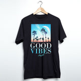StonerDays Good Vibes black cotton tee with retro palm design hanging on a wooden hanger