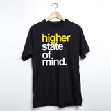 StonerDays Hsom Shatter Yellow men's t-shirt with bold lettering, front view on hanger