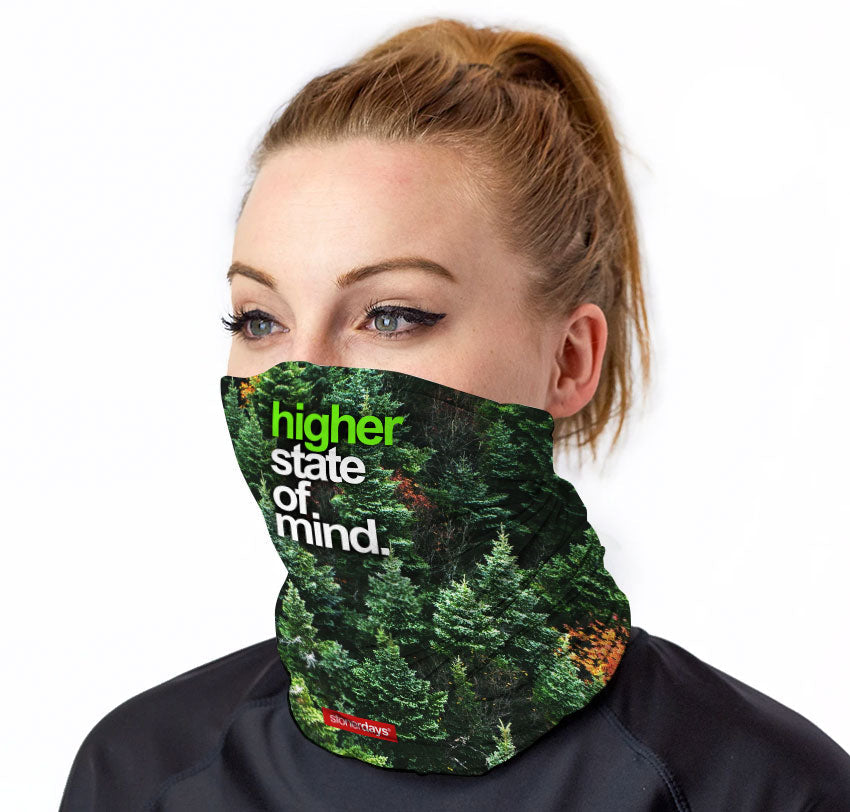 StonerDays Hsom Trees Neck Gaiter worn by model, forest design with text, UV reactive, one size