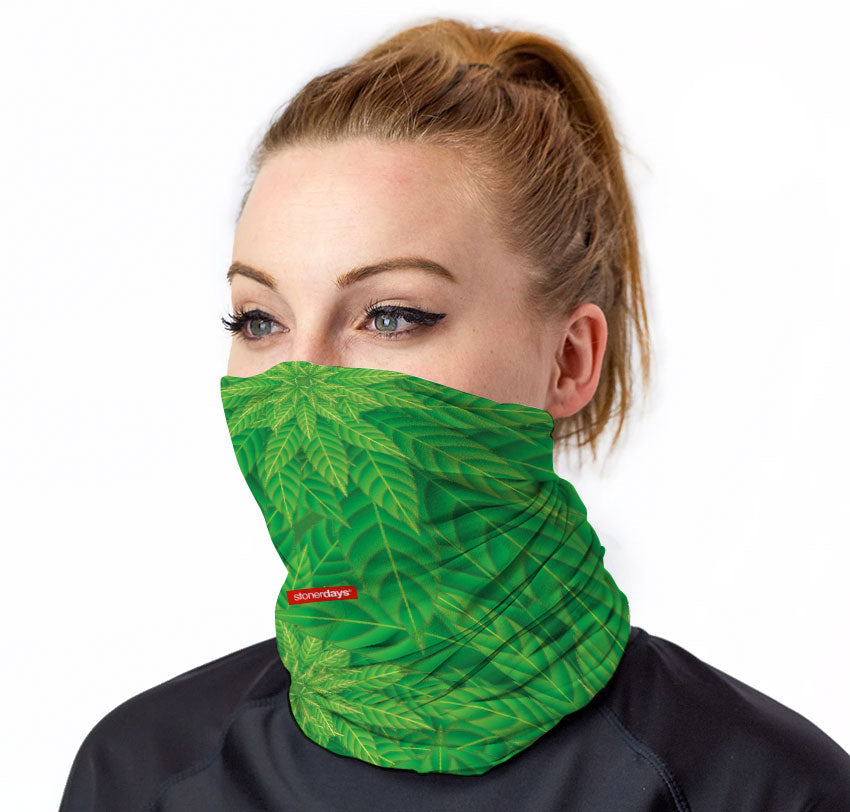 StonerDays Kaleidoscope Of Kush Neck Gaiter featuring vibrant green leaf design, front view on model