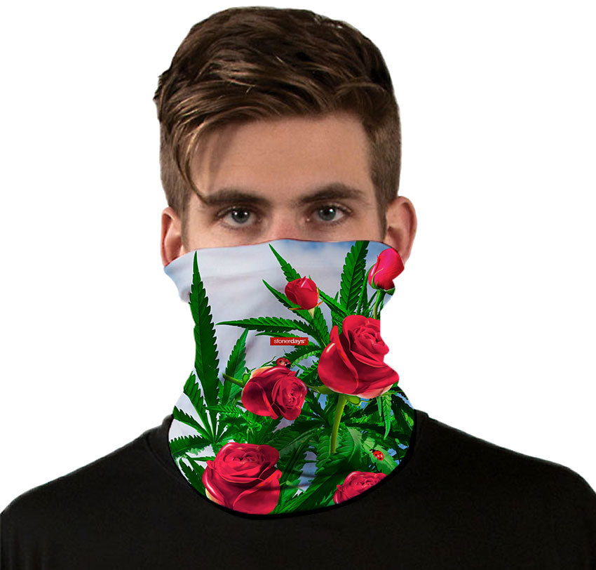 StonerDays Kush And Roses Neck Gaiter featuring vibrant floral and cannabis leaf design, front view on model