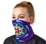 StonerDays Life Force Neck Gaiter featuring vibrant psychedelic print, front view on model