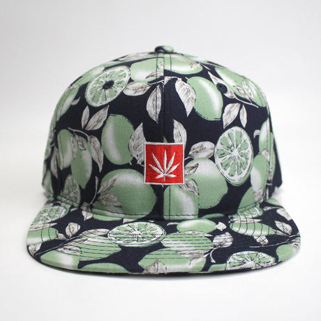 StonerDays Lime Trees Snapback featuring black cap with green lime print and red cannabis leaf logo