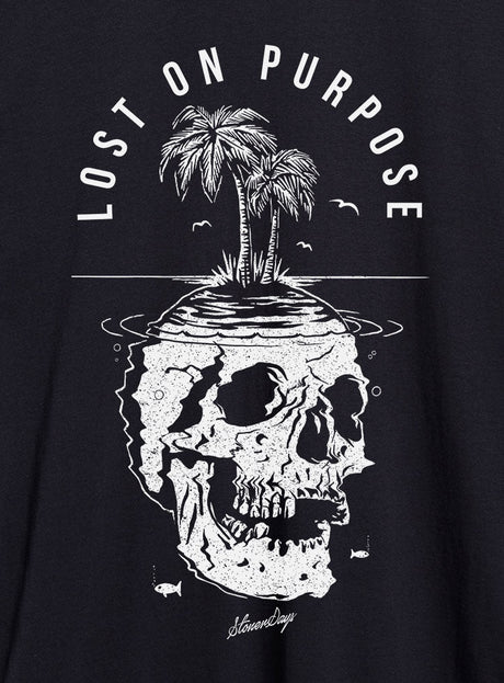 StonerDays 'Lost On Purpose' black t-shirt with skull and palm tree design, close-up view