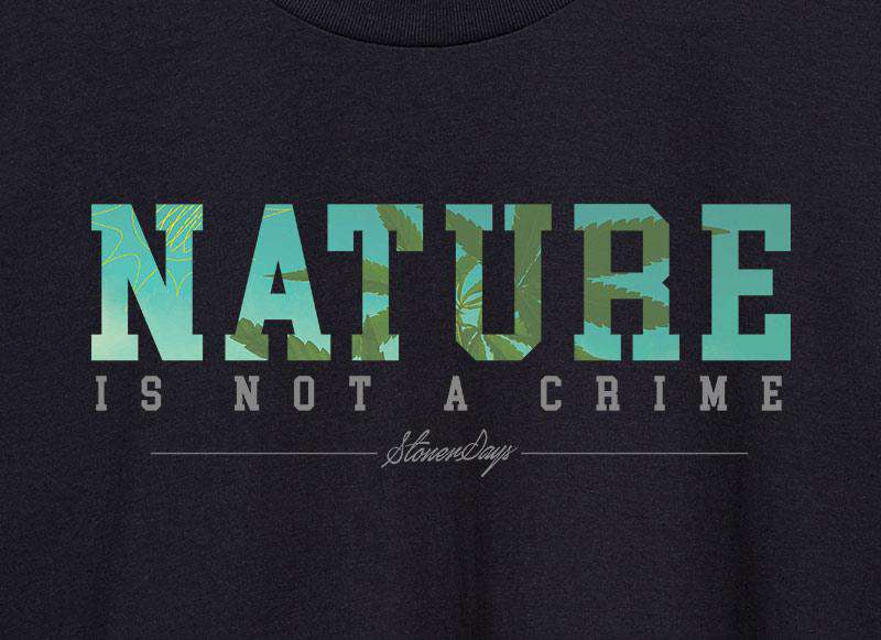 Close-up of StonerDays Men's Tee with 'Nature Is Not A Crime' print on green cotton fabric