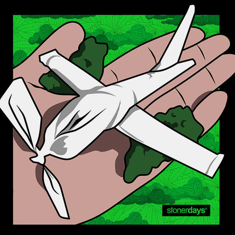StonerDays Paper Plane graphic t-shirt design, men's cotton apparel on a green leafy background
