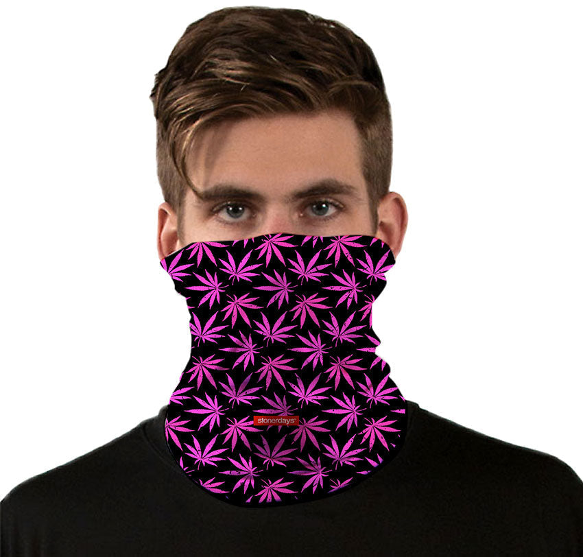 Front view of a person wearing StonerDays Pink Support Weed Leaf Pattern Neck Gaiter made of polyester